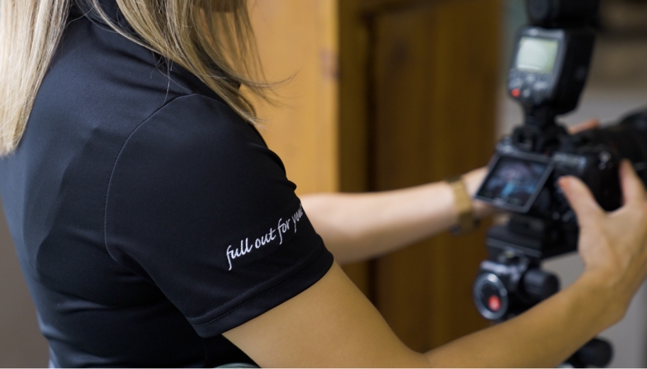 A Faris Team photographer using a DSLR camera