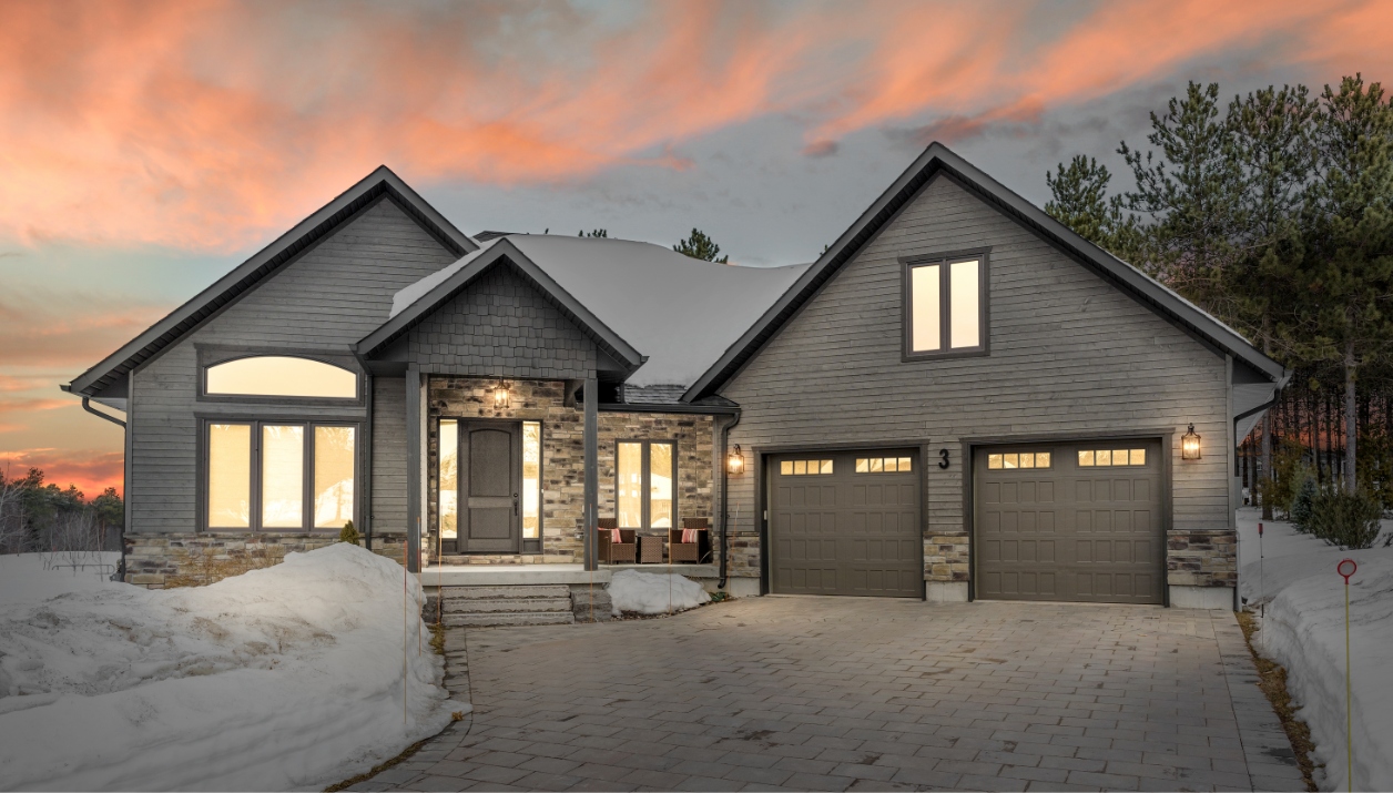 A twilight photo of a modern luxury home